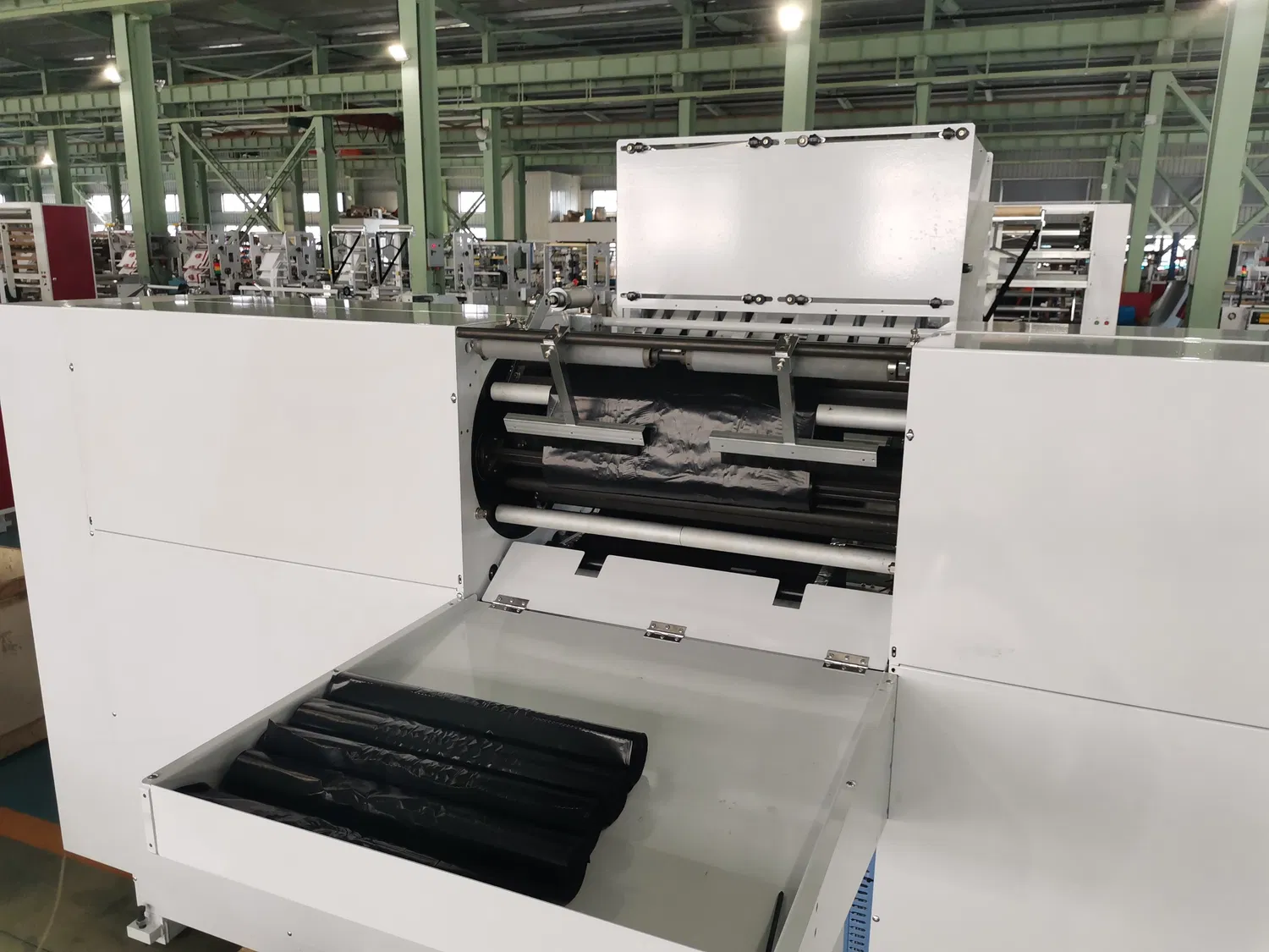 Fully Automatic Biodegradable Decomposable Star Sealing Plastic Garbage Bag-on-Roll Poly Trash Bag Coreless Making Machine